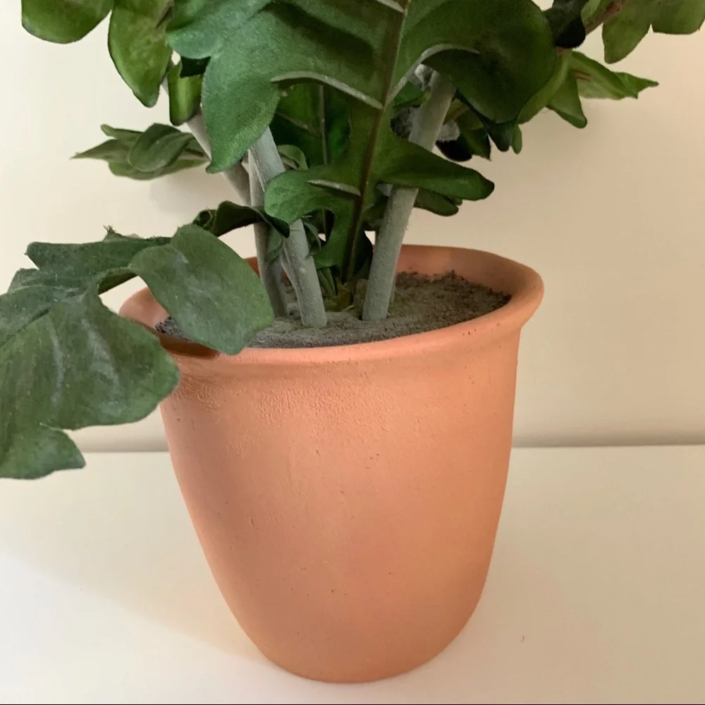 Large faux potted flowers